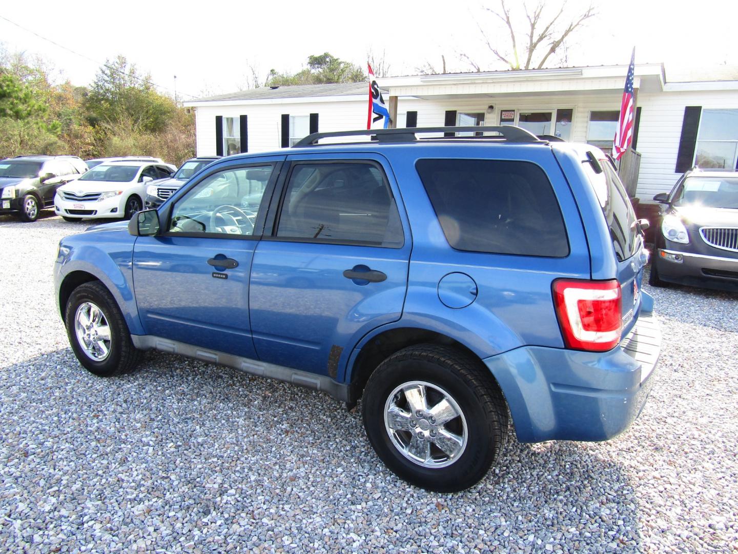 2010 Blue /Black Ford Escape XLT FWD (1FMCU0D72AK) with an 2.5L L4 DOHC 16V engine, Automatic transmission, located at 15016 S Hwy 231, Midland City, AL, 36350, (334) 983-3001, 31.306210, -85.495277 - Photo#5